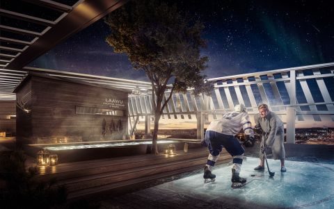 Lapland Hotels Arena mainoskuva. Kaksi miestä kattoterassilla pelaamassa jääkiekkoa. 